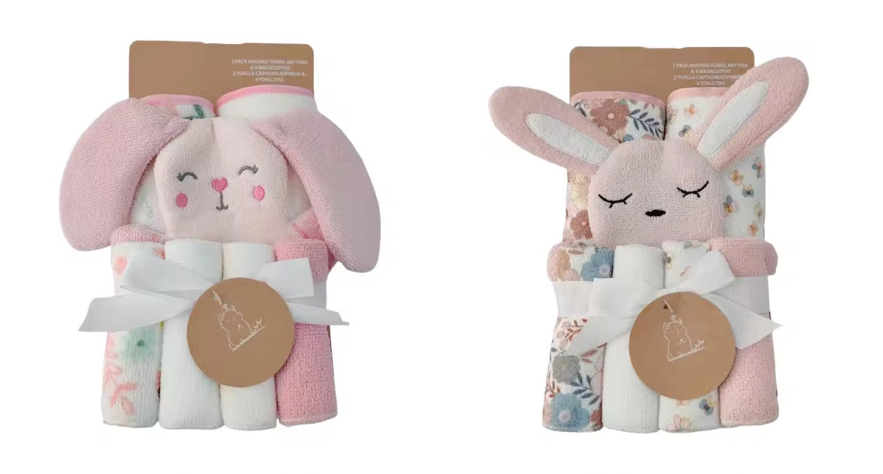 Set of baby bath towels with animal-themed ends in packaging on a white background